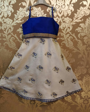 Off White Bhagalpuri Silk With Elephant Print All Over Skirt And Royal Blue Strap Blouse.