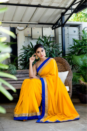 Yellow with blue malai silk sari