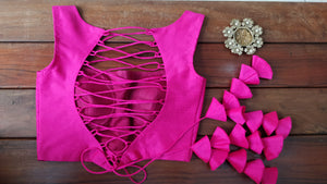 Hot pink sleeveless croptop.