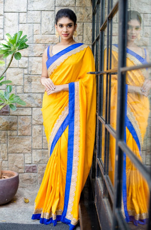 Yellow with blue malai silk sari